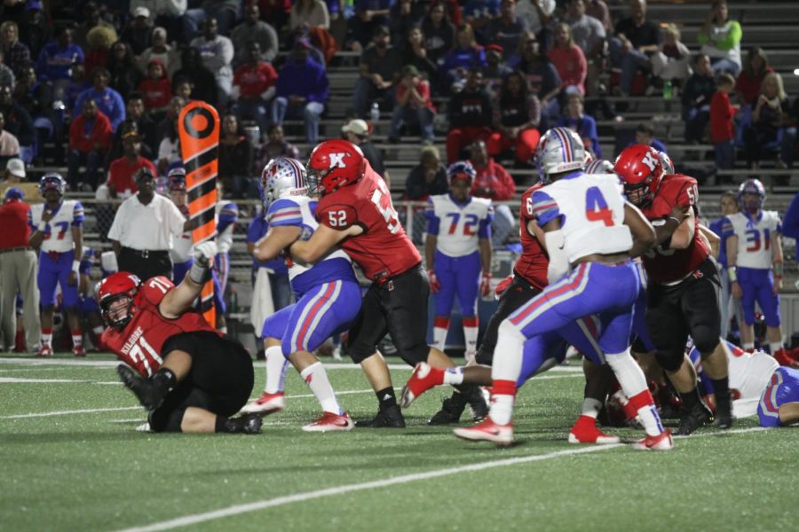 Senior Braden Grush blocks a player.