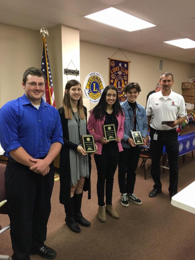 Students of the Month pose with their awards after having lunch with the Lions Club members. 