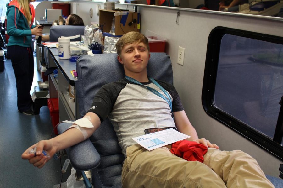 Senior Britton Jordan donating to the blood drive. 
