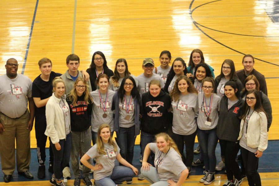 KHS UIL Team Poses After District March 21