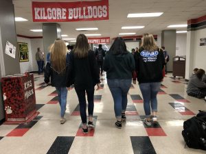 Sophomores Alexis M. Anderson, Halie Hanks, Carley Dollins and Shelby Maring walk away.