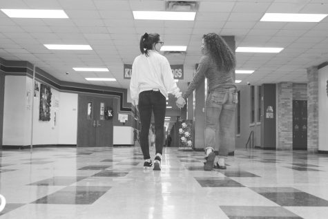 Sophomores Faith Jones and Olivia Arp demonstrate how to partake in a healthy, nontoxic friendship. Illustration photography. 