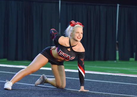 Gracie performs in Fort Worth for her competition cheer team ETAS.