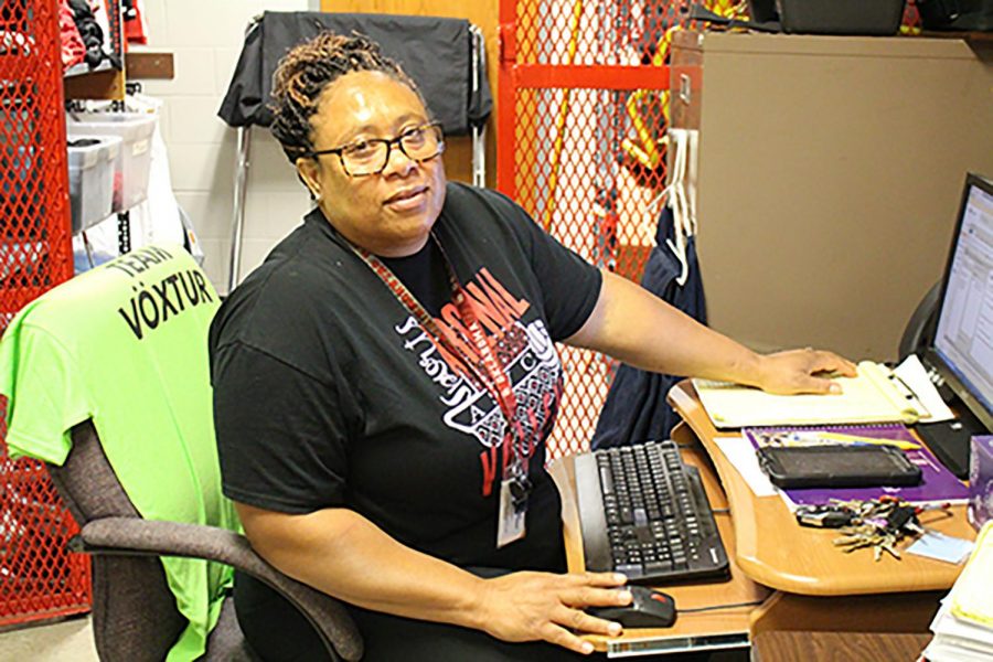 Madeleine Harris works on the computer in her office.