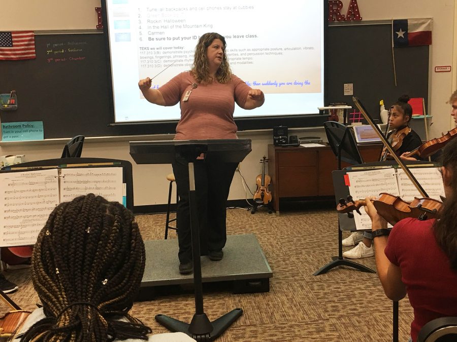 Ms. Paetznick conducts her chamber orchestra.