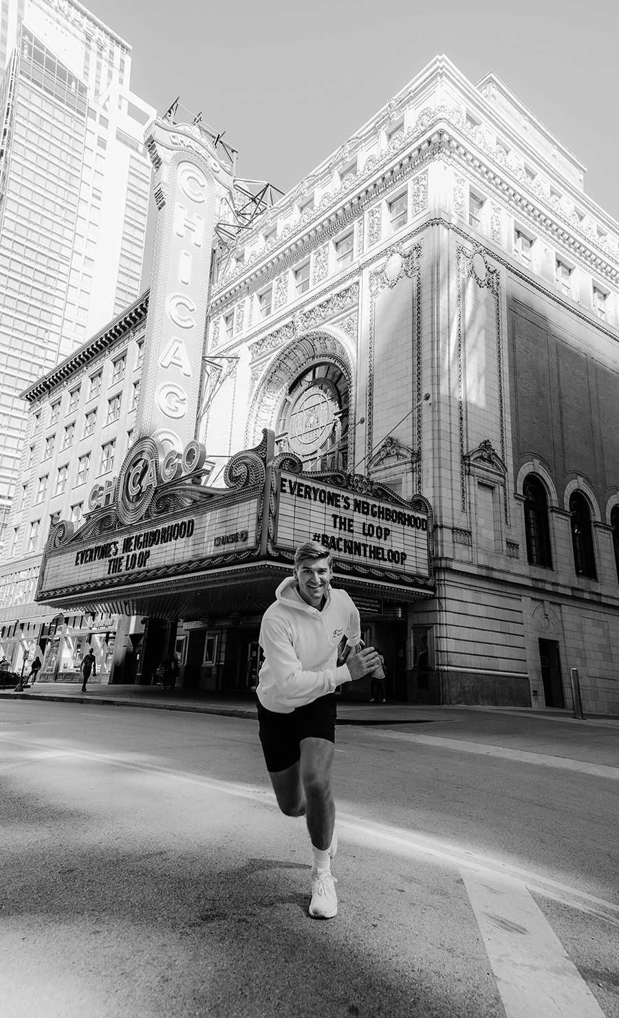 Hitting the streets • Fitness trainer & former KHS Bulldog Austin Head exercises in front of downtown Chicago Theatre. 