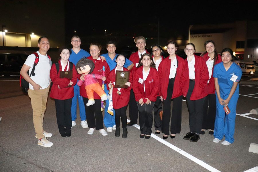 Senior Karlee Menges celebrates her first place award with the rest of the SkillsUSA team.