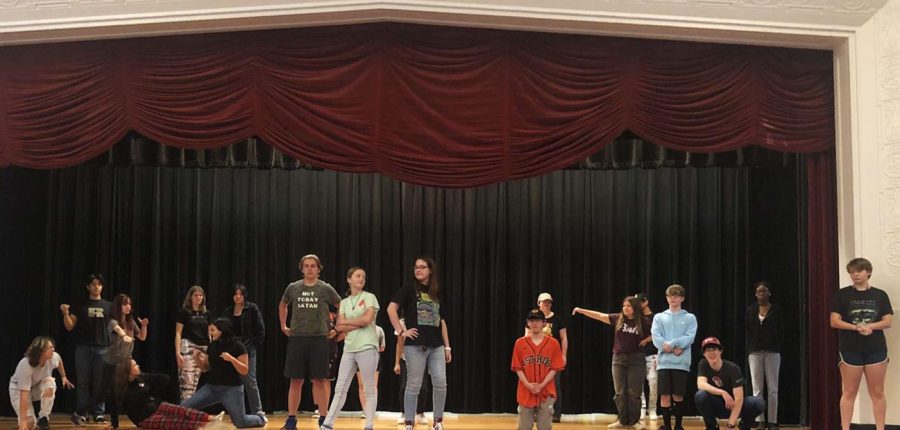 Theater students gathered on stage.