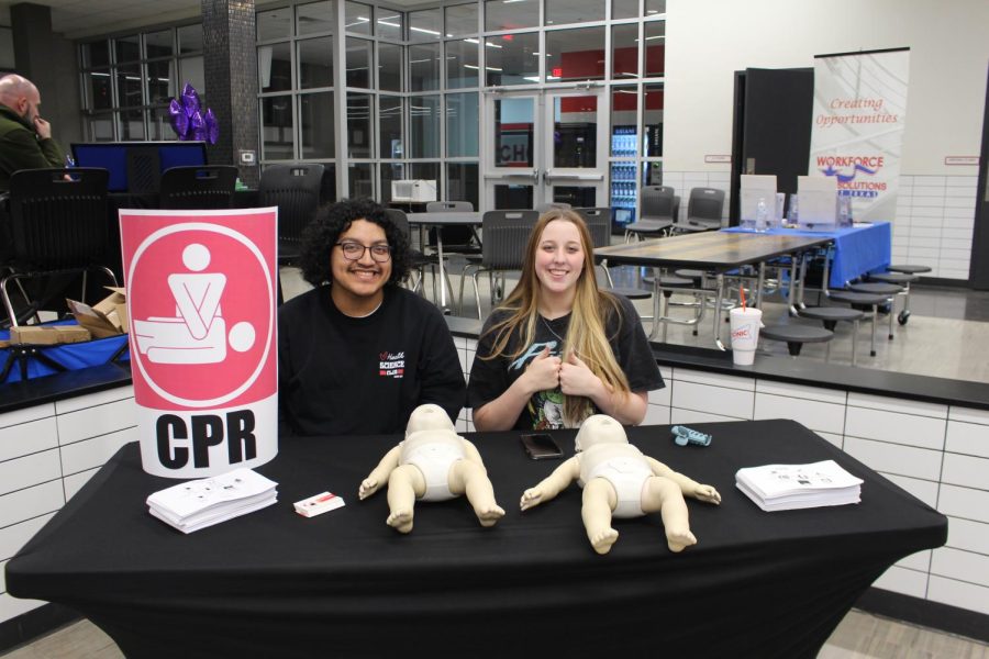 Juniors Jonathan Gonzales and Hailee Cochrane at their booth at the Health Fair. Staff photo.
