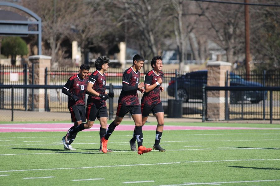 Running back in thrill after scoring • Jacob Contreras, Leandro Yzaguirre, Josue Rosas, and Chris Martinez.