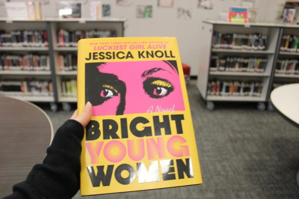Bright Young Women by Jessica Knoll is the intense story of the survivors of  the Ted Bundy murders coping with the loss of their loved ones. The cover art on this book represents the protagonist, Pamela, witnessing the event with her own eyes.