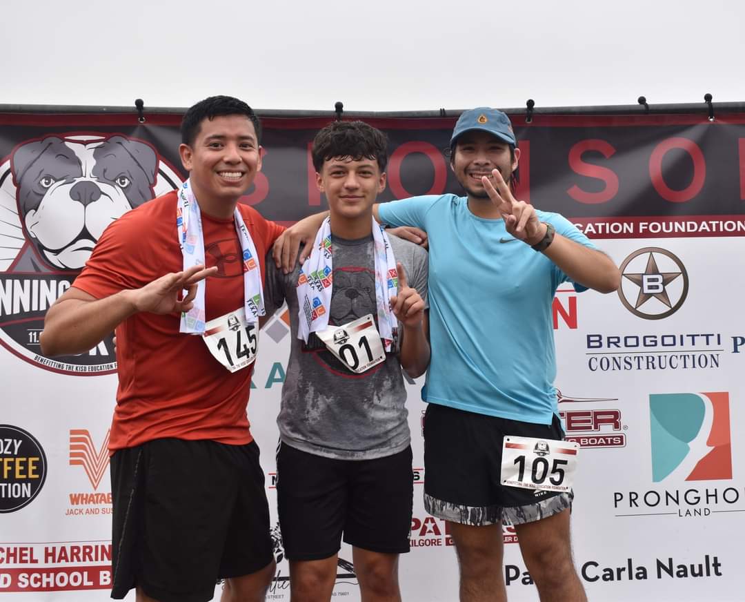 The mens top three, Joel Vegas third place, Adan Requena first place, second place Jose Sanchez.