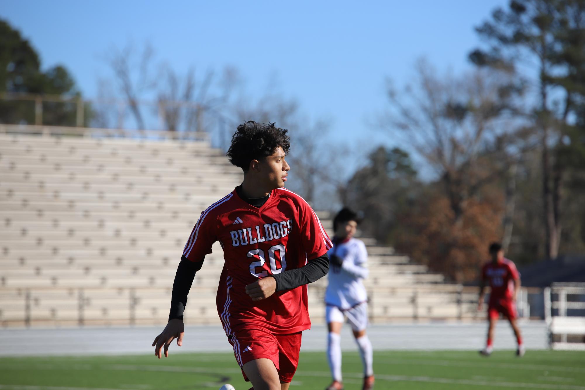 Varsity freshman player Ethan Reyes watches for the ball.